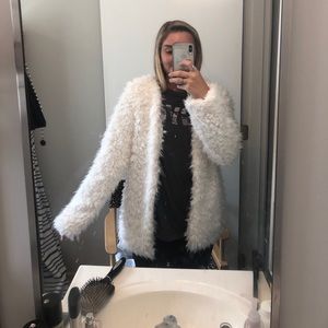 White fur jacket!